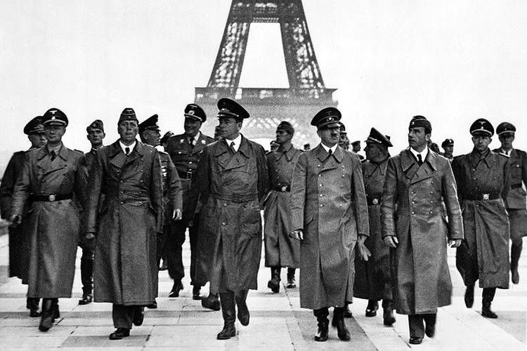 Hitler and cronies marching in front of Eiffel Tower in Paris - Your pelvis