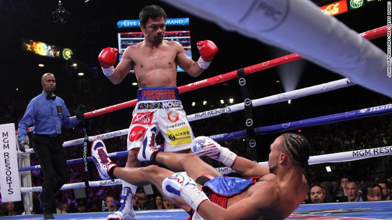 Manny Pacquiao beat Keith Thurman in the WBA welterweight title fight Saturday, flooring the American in the first round. 