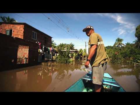People return home after flooding in Brazil