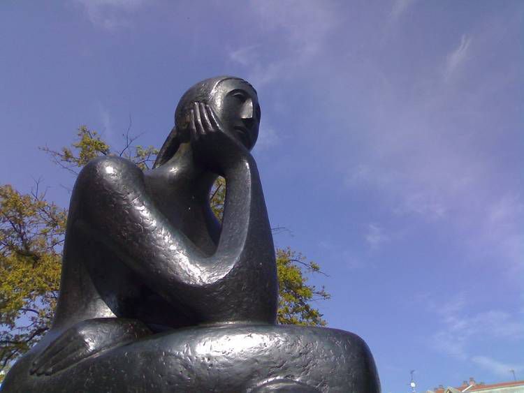Statue of woman thinking - The energy of yes