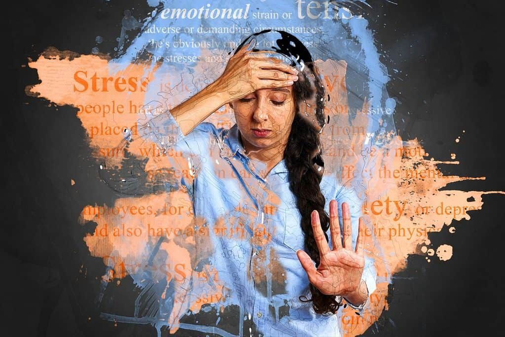 stressed woman holding head